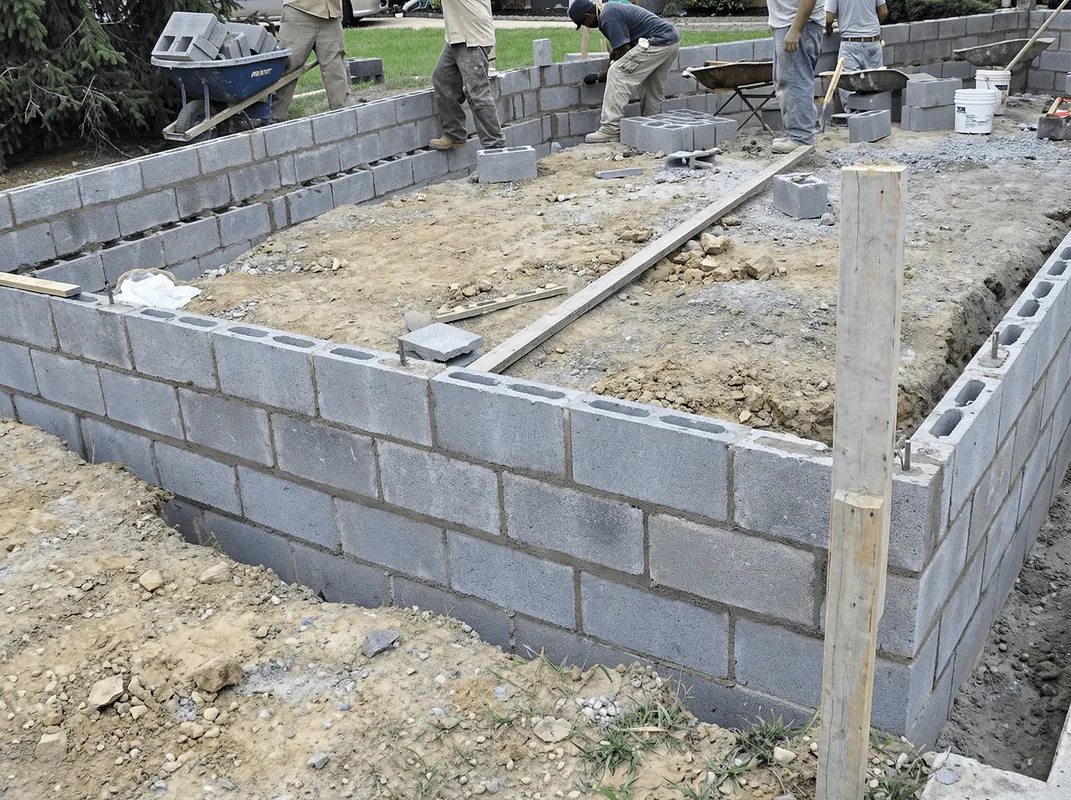Professionals building a foundation with blocks in Tacoma, WA