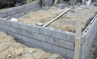 Professionals building a foundation with blocks in Tacoma, WA