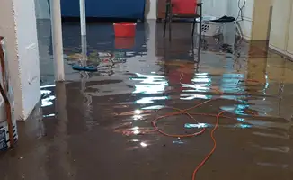 Basement with boiler, cabinets and washing machine completely flooded in Tacoma, WA