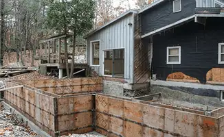 Prepared site with foundation forms for home remodeling and addition project in Tacoma, WA